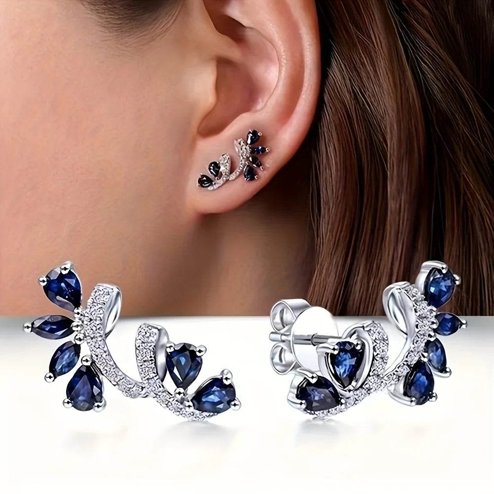 A pair of blue threaded zircon earrings and a white zircon bracelet. Suitable for women to wear. A cute and shiny combination.