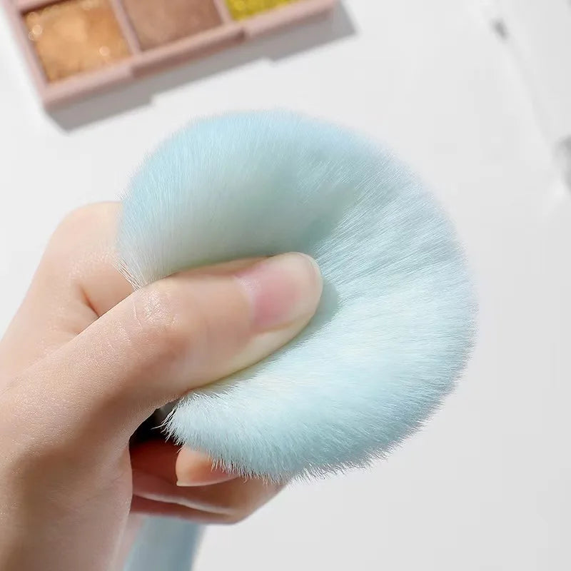 A full set of makeup tools including 7 colored makeup brushes, loose powder, contouring, eyeshadow, eyebrow brushes, etc